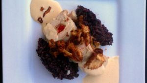 Chicken roulade stuffed w artichoke speck and roasted red pepper, over black sushi rice w crispy fennel and smoked Gouda Gruyere Béchamel.