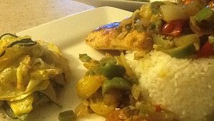 imagepan seared Mahi, Vera Cruz over basmati rice with sautéed ribbons of squash 