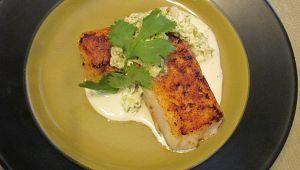 Seared hake w cilantro/ 4-pepper crema.