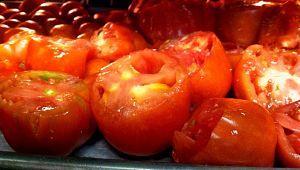 Tomatoes roasting to prepare to sauce